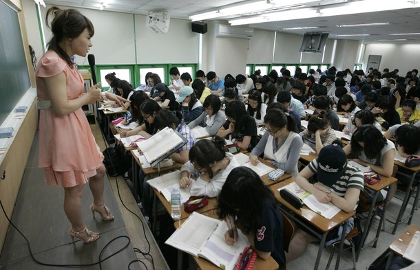English teacher Rose Lee gives a lecture at a cram school in Seoul