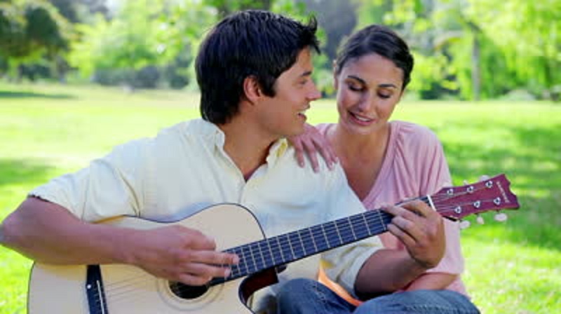 stock-footage-smiling-couple-singing-together-in-the-countryside